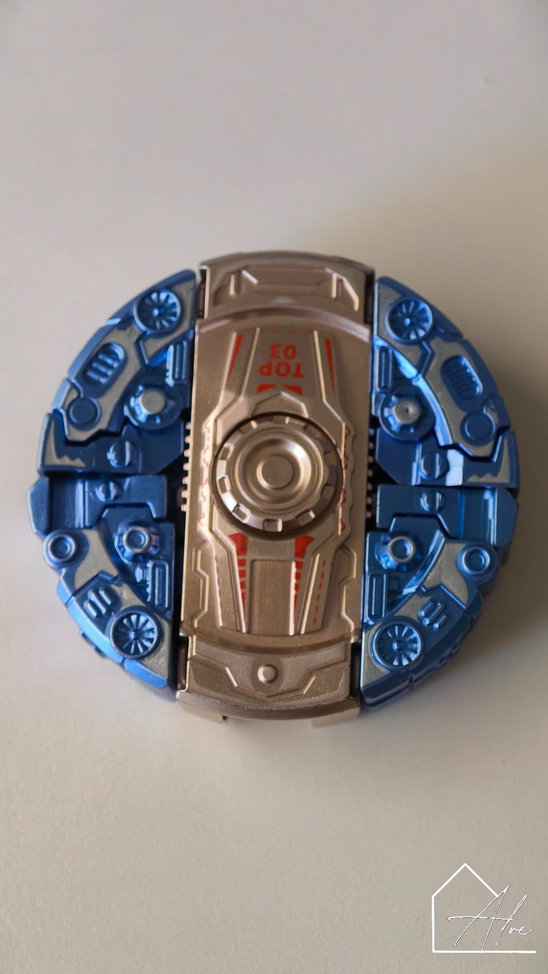 Transformable fidget spinner – robot to spinner transformation step