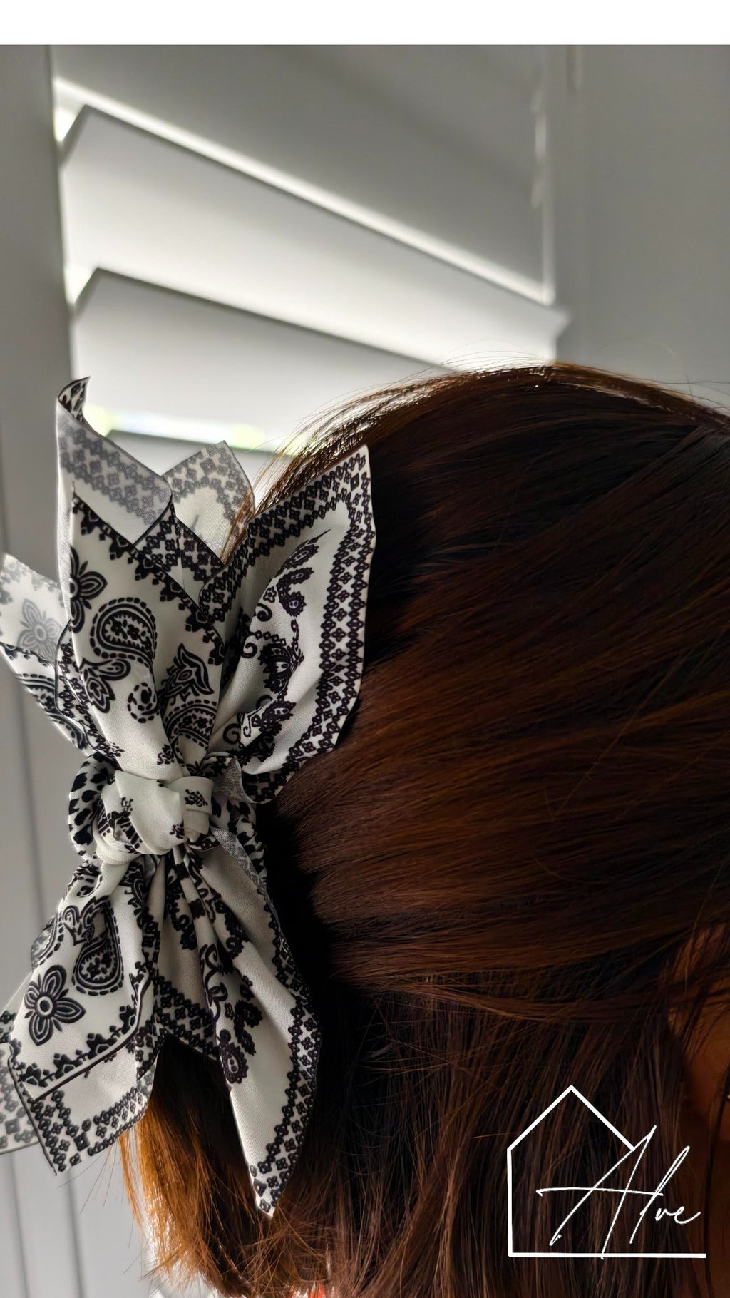 Double-sided flower hair clip in hair – hides the clip shows the style
