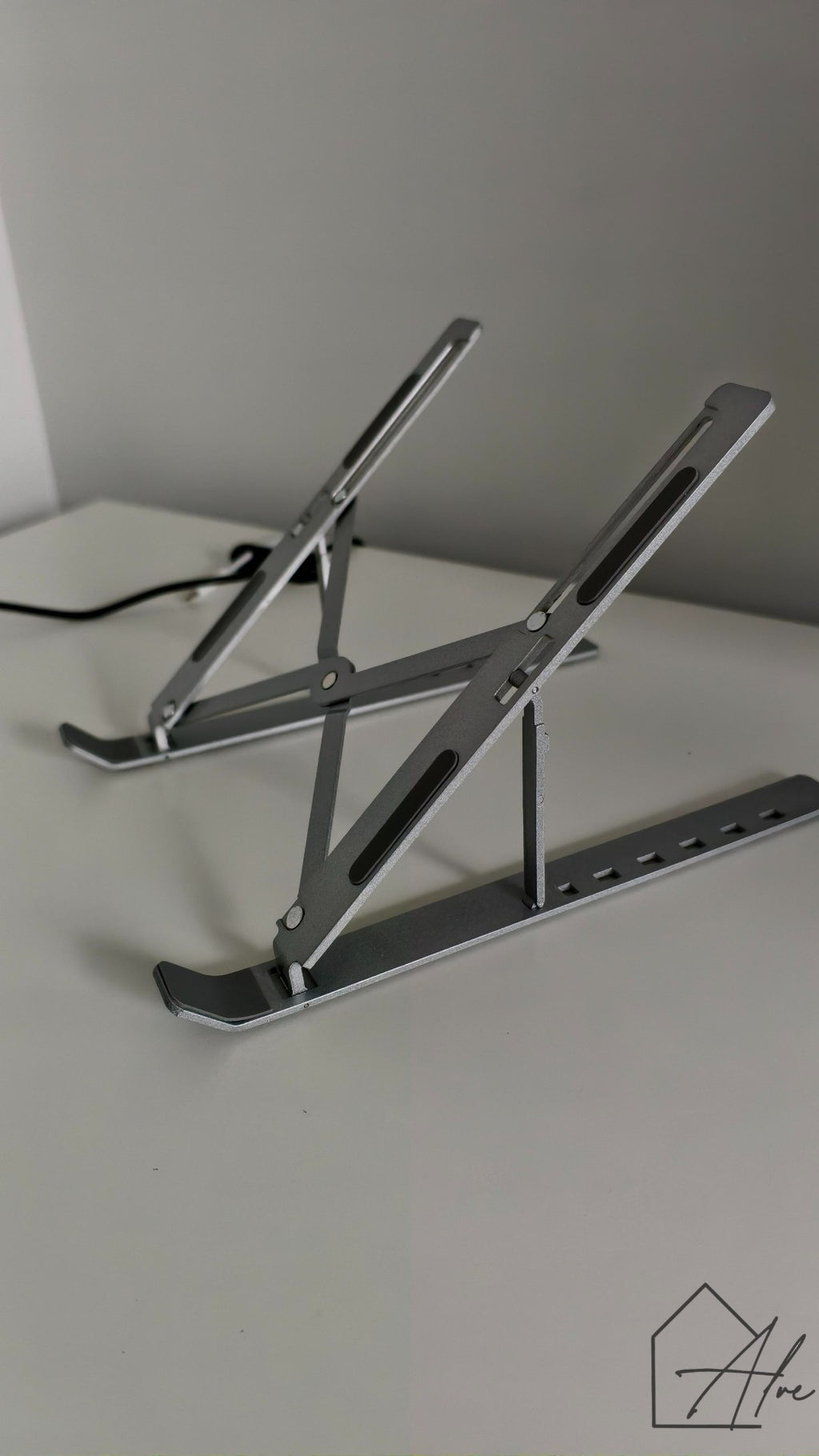 Foldable laptop riser with notebook – great for home office setup