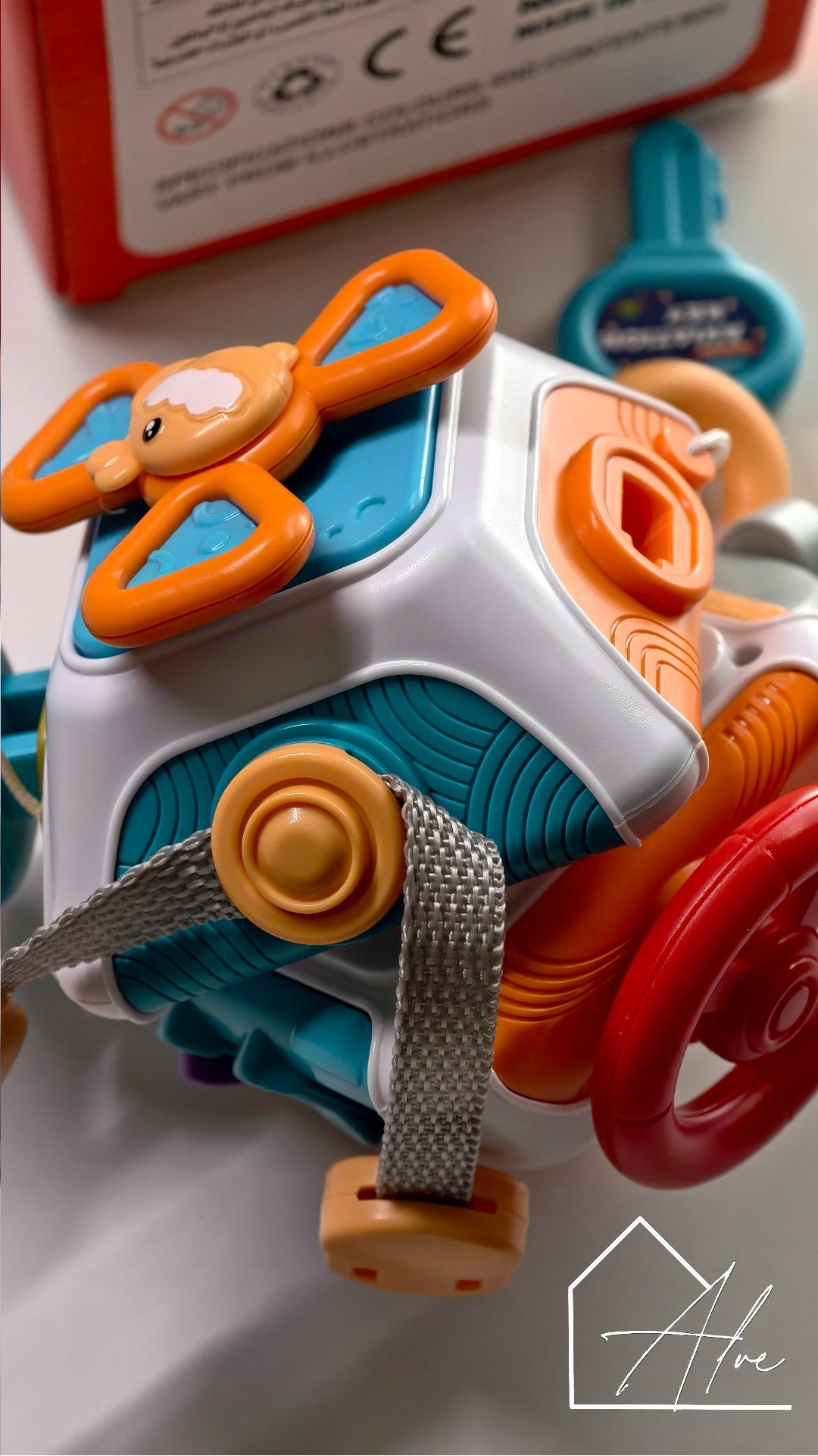 Sensory educational toy in use – child developing fine motor skills