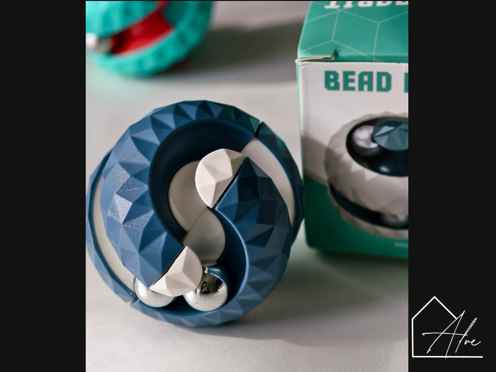 Blue sphere fidget ball viewed from a different angle with a steel bead inside