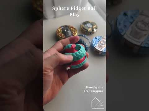 Close-up of the sphere fidget ball's two rotating halves and faceted low-poly surface