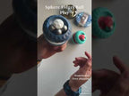 Steel beads rolling around the internal channel of the sphere fidget ball as it is turned
